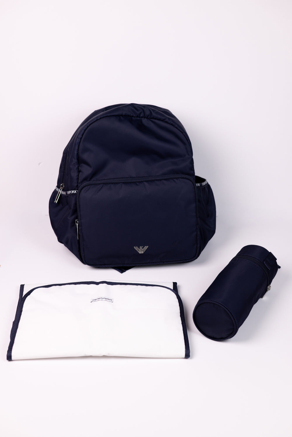 Emporio Armani Mommy’s Backpack containing a changing mat and bottle holder with zip