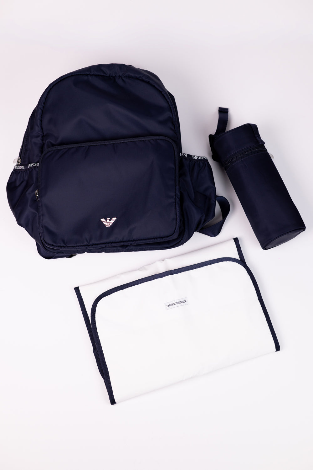 Emporio Armani Mommy’s Backpack containing a changing mat and bottle holder with zip