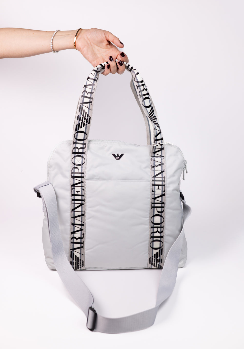 Emporio Armani Mommy’s Bag containing a changing mat and bottle holder with zip