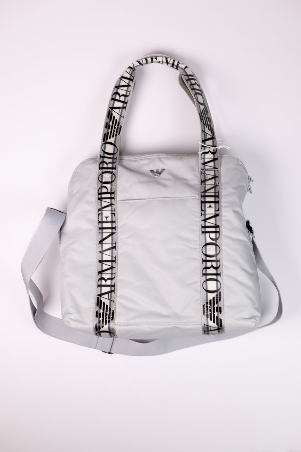 Emporio Armani Mommy’s Bag containing a changing mat and bottle holder with zip